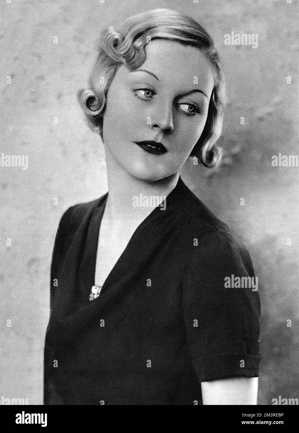 Mrs Bryan Guinness, formerly Diana Freeman Mitford (1910-2003), one of the notorious Mitford sisters and society beauty pictured in The Tatler in 1933. Left Bryan Guinness for Oswald Mosley. Imprisoned during WWII for being fascist sympathisers. Never repented her views.      Date: 1933 Stock Photo
