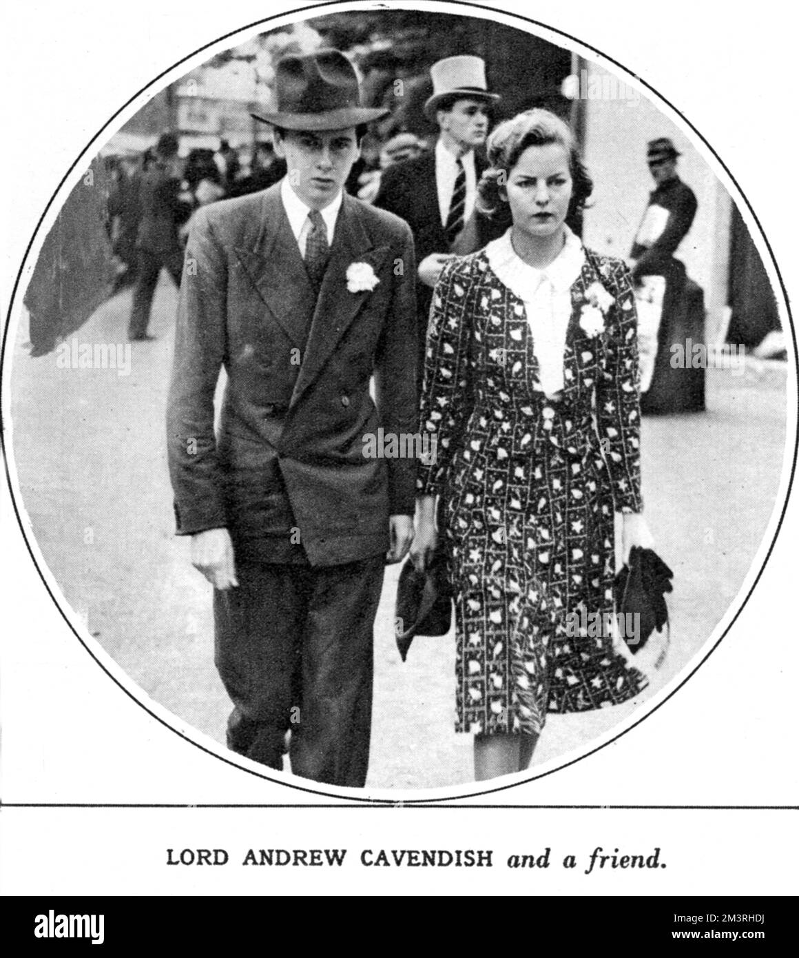 Lord Andrew Cavendish, pictured with a woman described as, 'a friend,' in fact, Deborah Freeman Mitford, his future wife.  Andrew Robert Buxton Cavendish, 11th Duke of Devonshire (1920-2004), aristocrat and landowner was second son of the 10th Duke of Devonshire.  Together with his wife, Deborah Mitford, he was responsible for restoring Chatsworth House to its former glories.     Date: 1939 Stock Photo