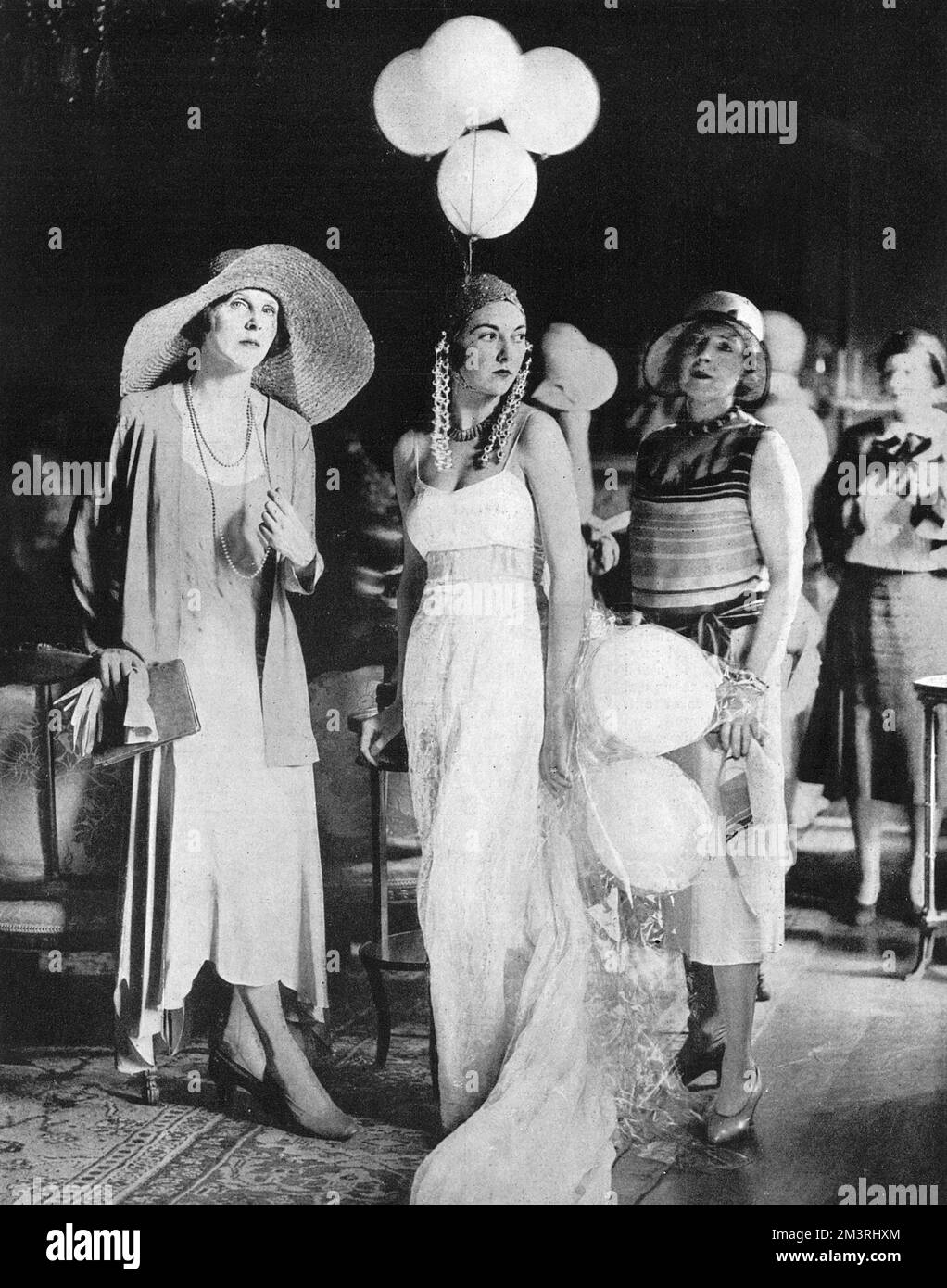 Lady Diana Cooper, Mrs. Baillie-Hamilton and Lady Cunard rehearsing for the Living Poster Ball, held in aid of the Children's Country Holiday Fund and the Elizabeth Garrett Anderson Hospital at Park Lane Hotel.  1930 Stock Photo