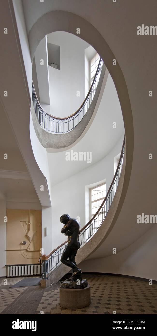 Foyer with free-swinging Art Nouveau staircase and Auguste Rodin's Eva ...