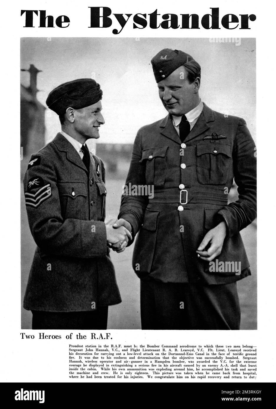 The front cover of The Bystander features John Hannah and Roderick Learoyd, two R.A.F. pilots who recently received the Victoria Cross. Hannah's V.C. was given to him for extinguishing a fire on board his aircraft while under bombardment from A.A. guns, while Learoyd earned his for a daring bombing raid on the Dortmund-Ems Canal.  1940 Stock Photo