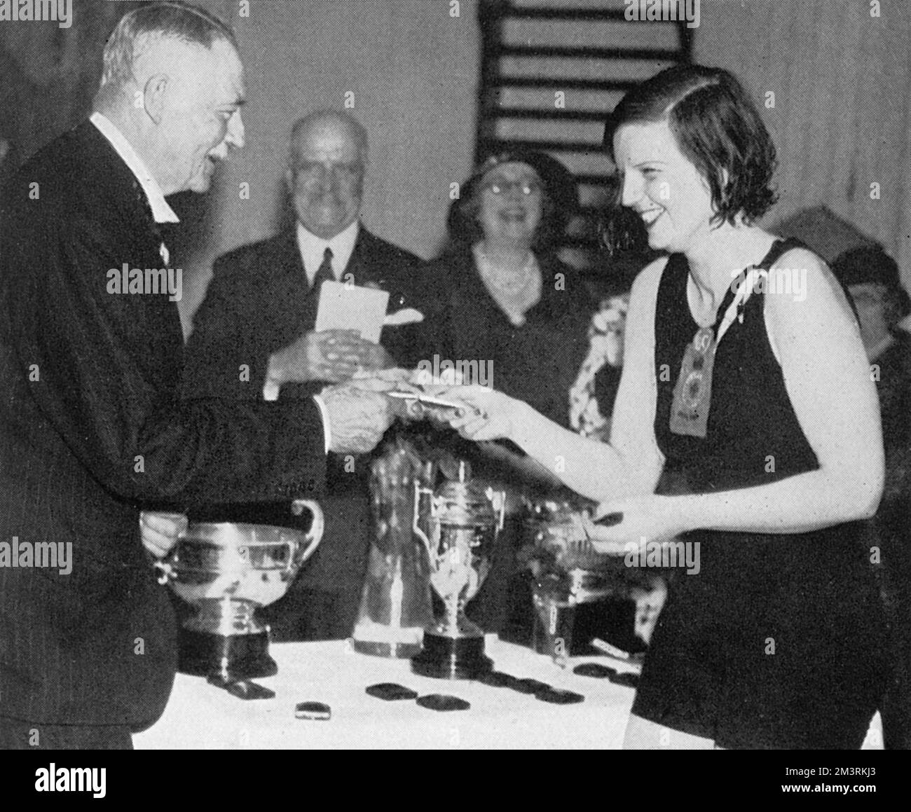 Lord Desborough presenting Lady Alington (the former Lady Mary Ashley