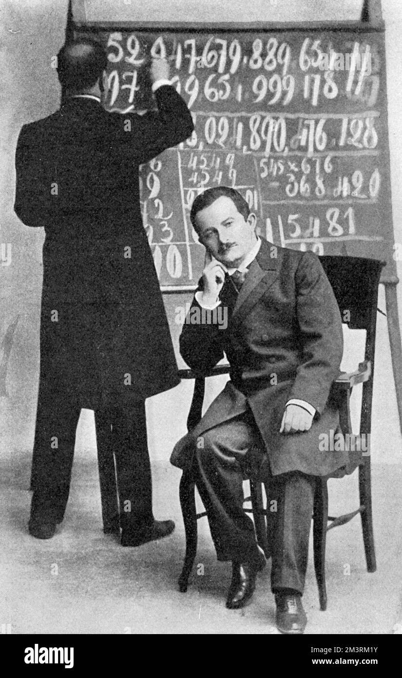 Inaudi, the lightning calculator, performing at the Hippodrome, able to do mentally any sum given by the audience up to twelve figures in addition, subtraction and multiplication.       Date: 1903 Stock Photo