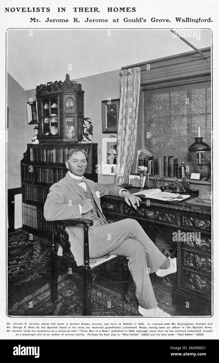 Jerome Klapka Jerome (1859 - 1927), popular English writer, author of 'Three Men in a Boat', pictured at a writing desk in his home at Gould's Grove, Wallingford. Stock Photo