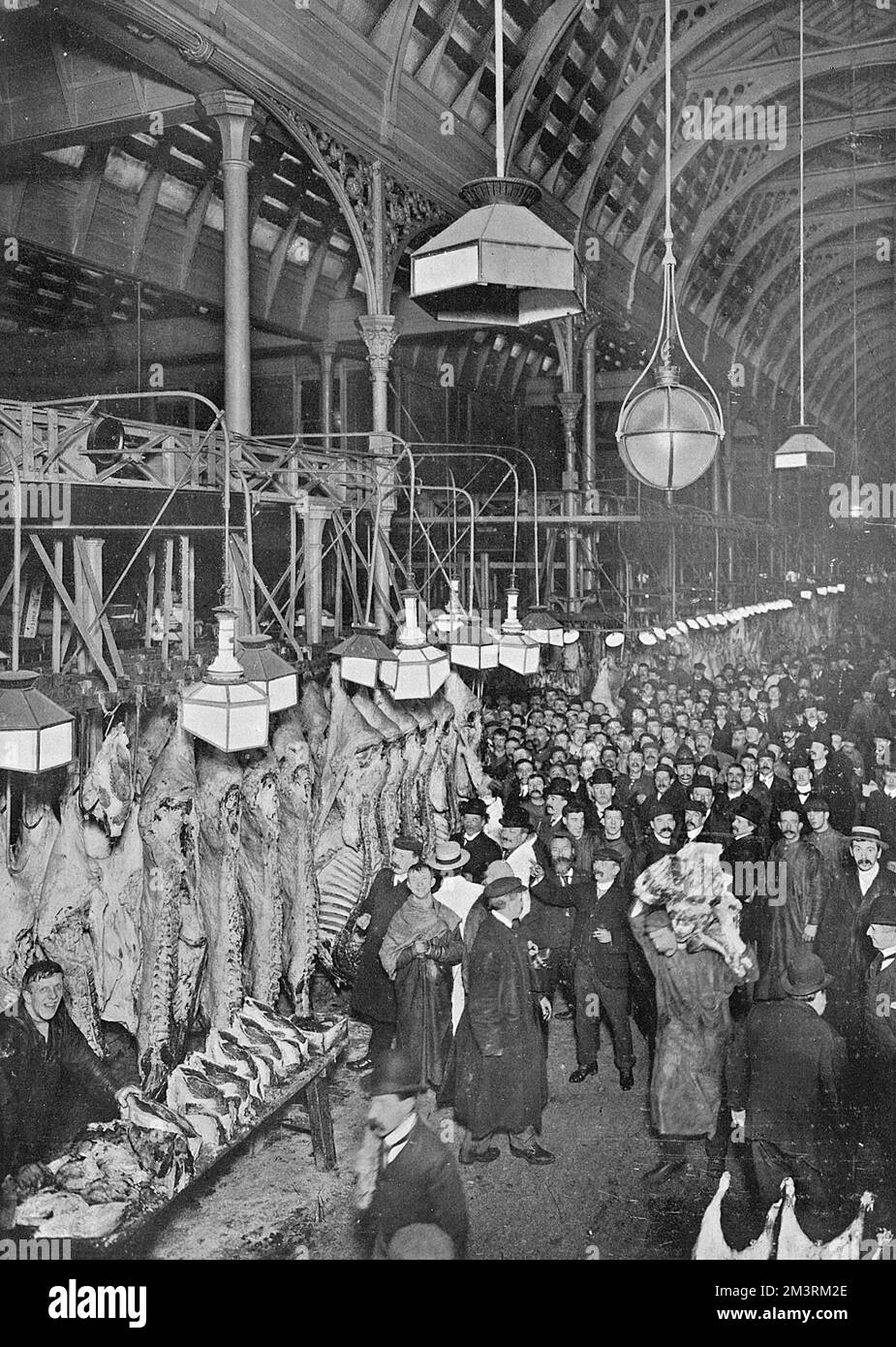 Overview of Smithfield Meat Market, London, showing a brisk trade for