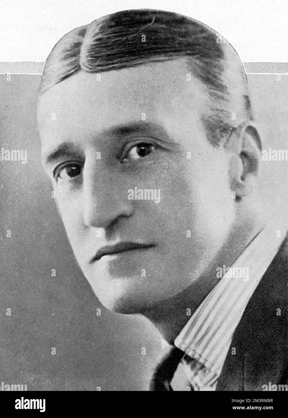 Captain Ulick Brown,fashion designer and presiding genius of Ulick Ltd in New Burlington Street.       Date: 1929 Stock Photo