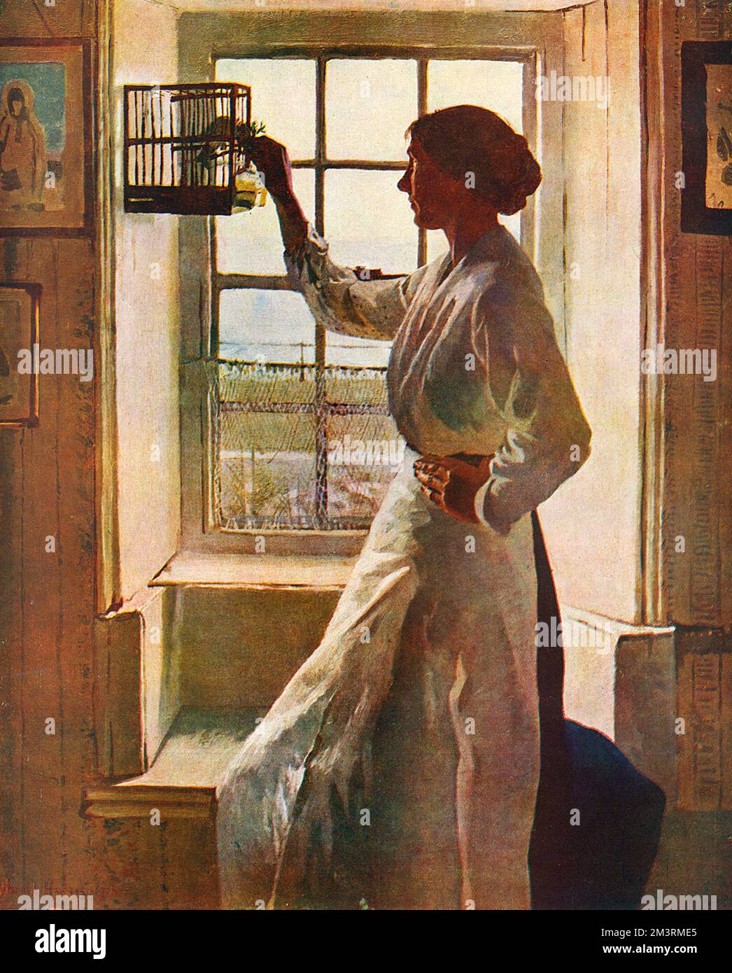 The Cottage Window by Harold Harvey (1874-1941), one of the Newlyn School of Painters, showing a woman feeding a small bird in a cage by a cottage window.       Date: 1919 Stock Photo
