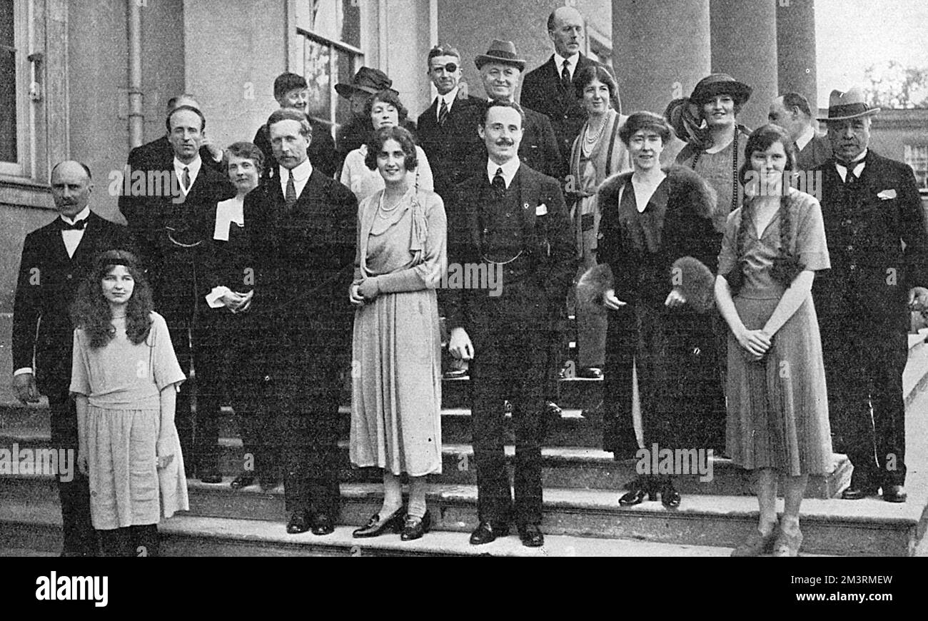 Group shot taken at Hackwood, the home of Lord Curzon near Basingstoke, on the occasion of the marriage of his daughter, Lady Cynthia Curzon to Oswald Mosley in May 1920.  The wedding was attended by, among others, the Belgian royal family (King Albert and Queen Elisabeth are pictured either side of the newlyweds).     Date: 1920 Stock Photo