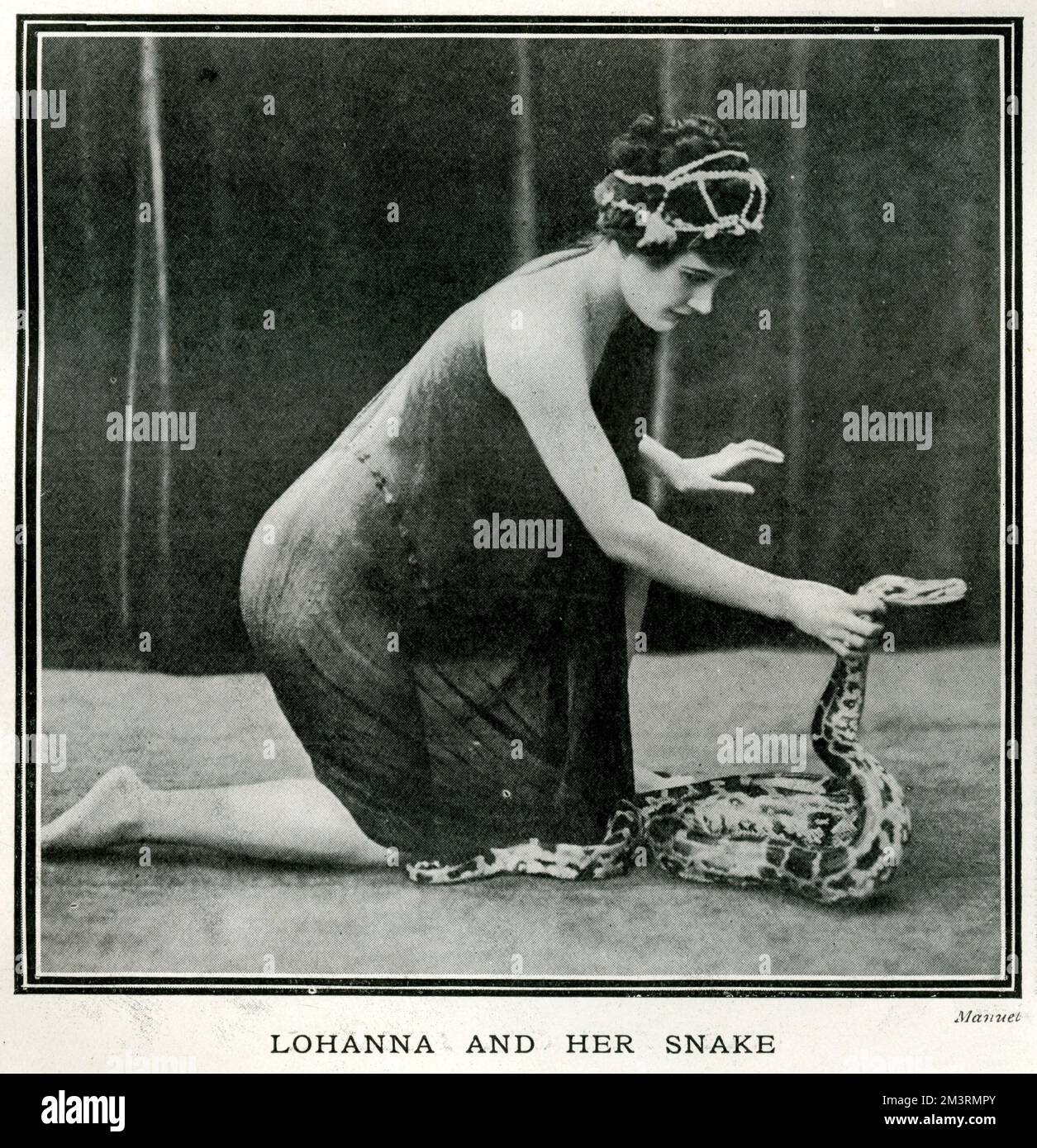 Lohanna, French actress that did theatrical dances in Paris with a snake.  1912 Stock Photo