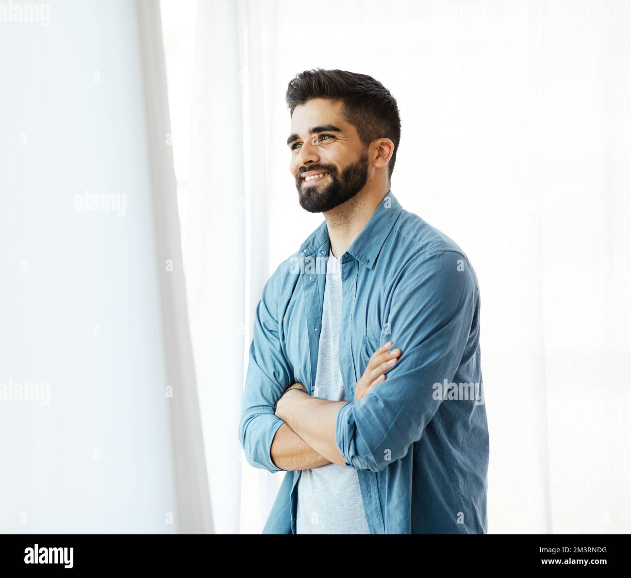 Portrait of young hipster man button up on gray suit casual poses