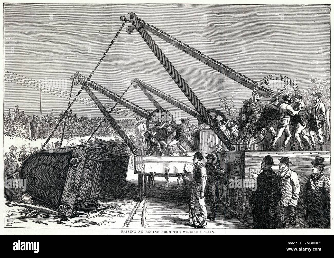 Railway accident at Abbot's Ripton, Huntingdon. Raising an Engine from the wrecked Train.     Date: January 1876 Stock Photo