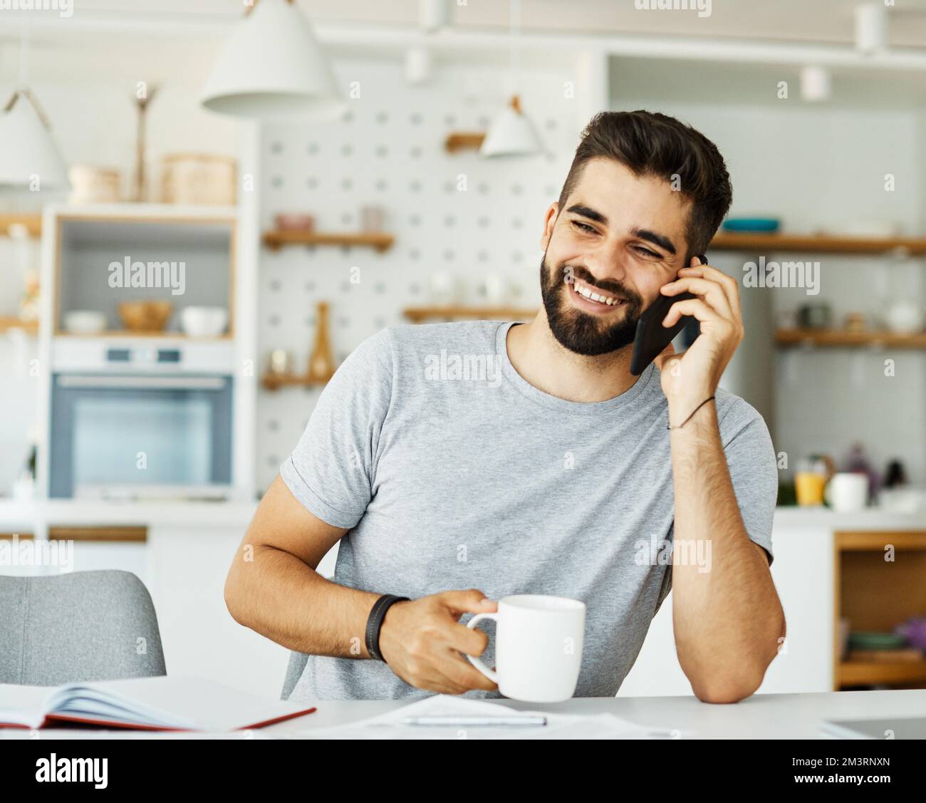 man phone home technology communication mobile smartphone call office adult young business smiling Stock Photo