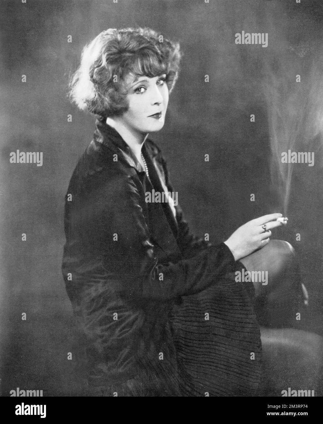 Peggy Carlisle (born 1904), actress pictured at the time she was starring in 'Hindle Wakes'.     Date: 1927 Stock Photo