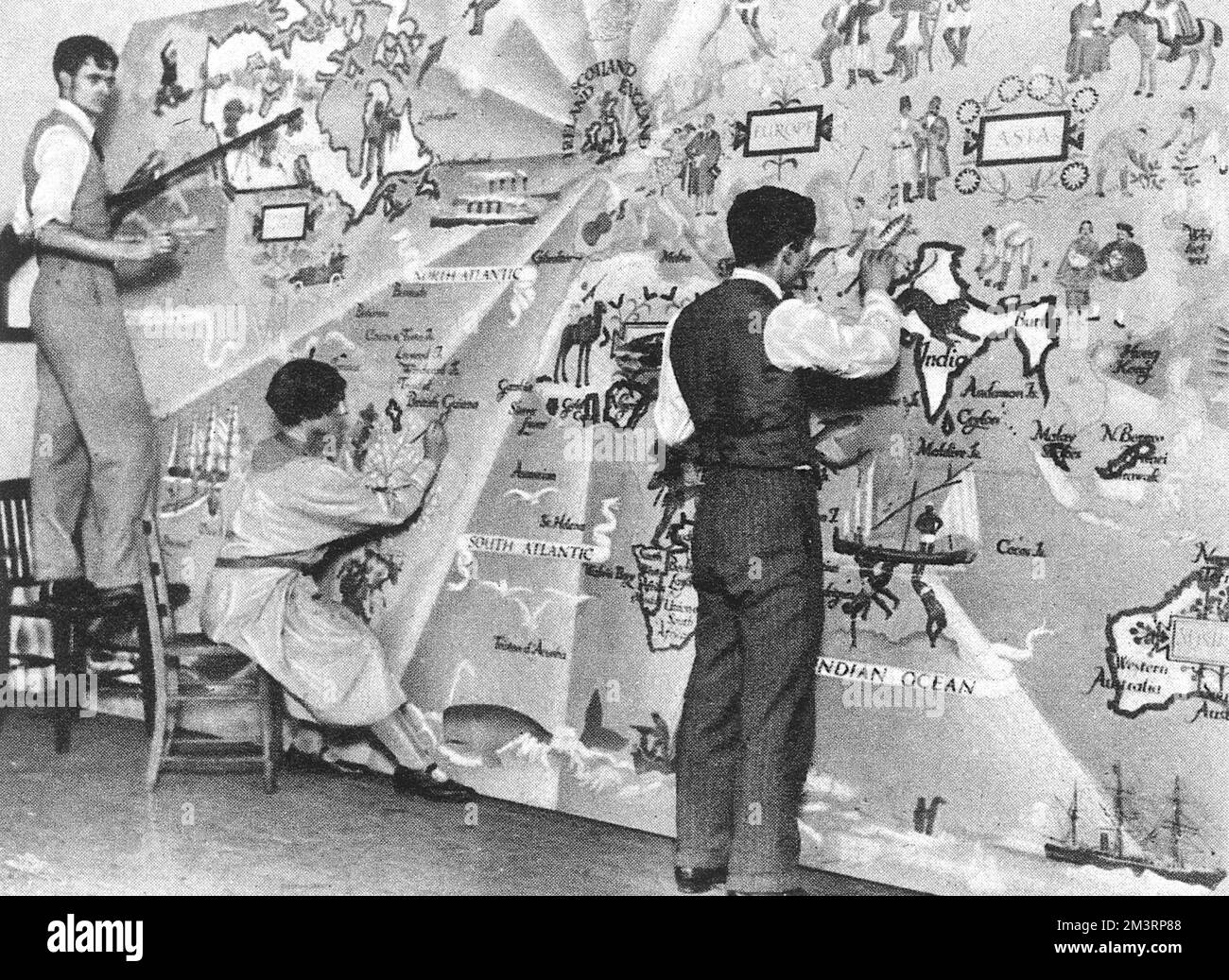 Black and white photograph of artist Stephen Bone in the Sketch of 12th December 1928, painting a mural in the new Piccadilly underground station.      Date: 12th December 1928 Stock Photo