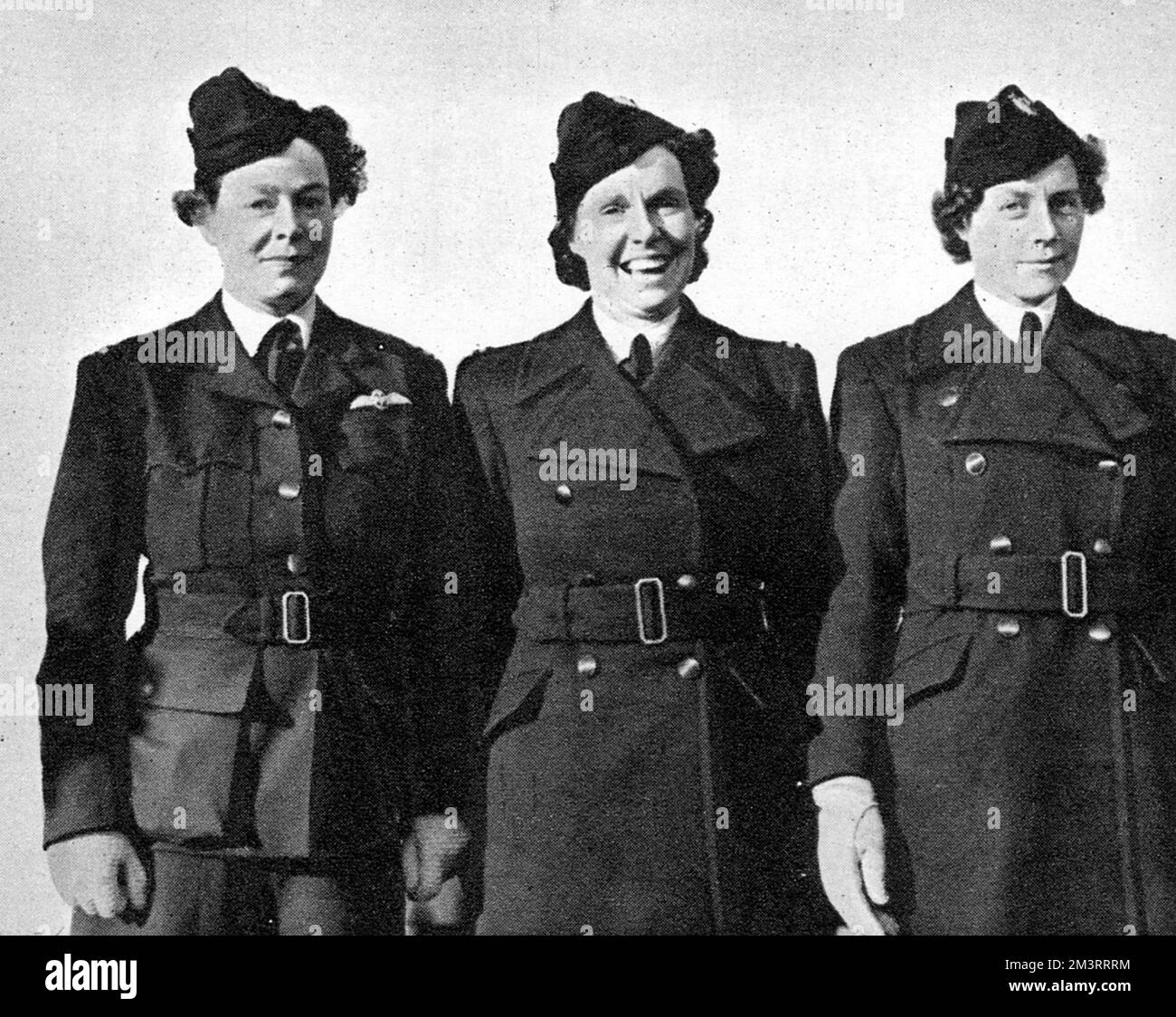 Pilots of the Air Transport Auxiliary Service: Mrs G. Patterson, Miss Rosemary Rees and Mrs Marion Wilberforce.     Date: 1940 Stock Photo