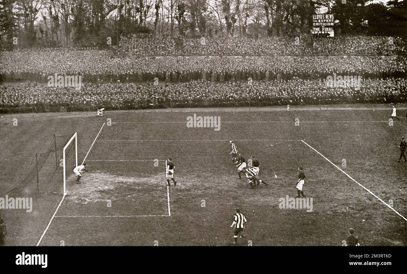 Newcastle United vs. Barnsley in the F.A. Cup Final at the Crystal Palace, 1910. Barnsley's goalkeeper saving. The match was a one-all draw and had to be re-played at Everton.     Date: 1910 Stock Photo