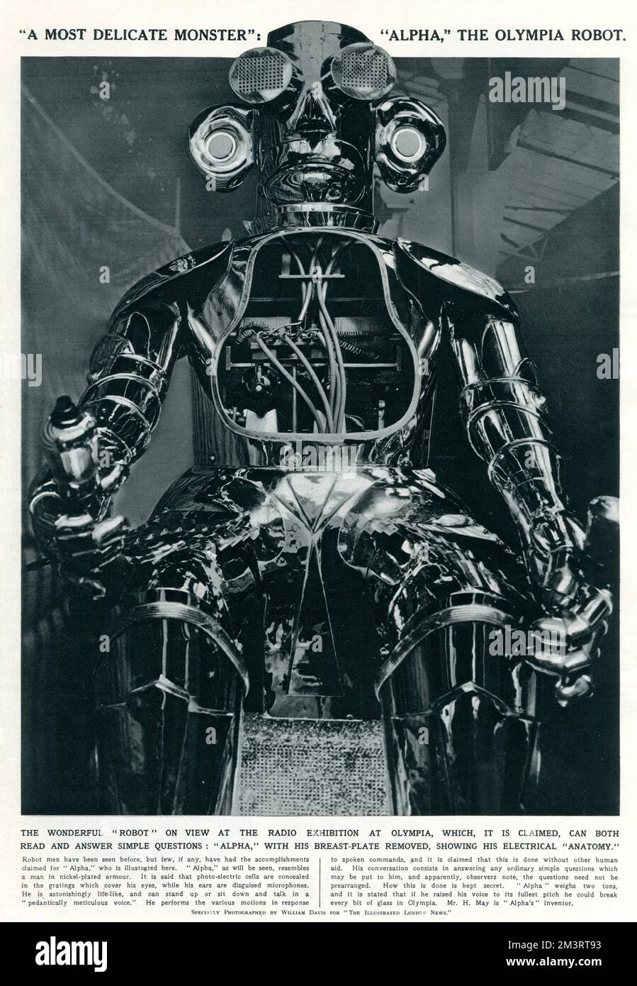 Nickel-plated armour 'Alpha', an electronic robot, designed by H. May, that could read and answer simple questions, being shown at the Olympia Exhibition.     Date: 1932 Stock Photo