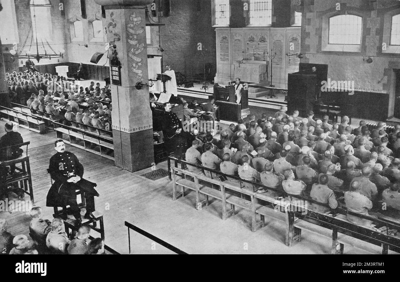 Convicts in church at Portland with warders on raised seats.     Date: 1910 Stock Photo