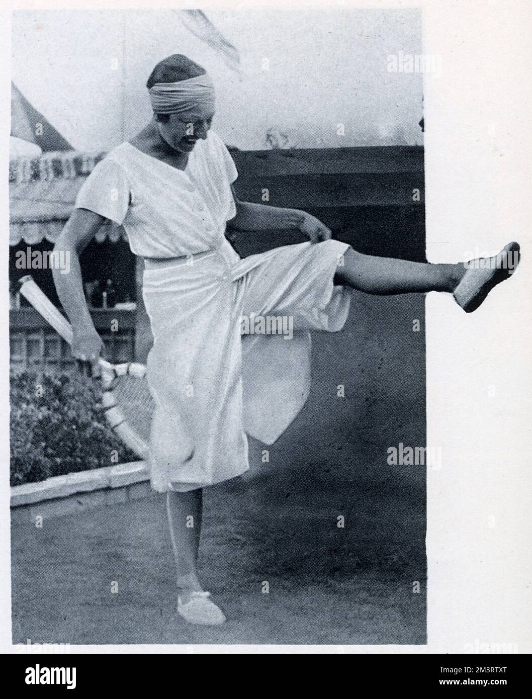 Suzanne Lenglen, tennis player, wearing long shorts Stock Photo