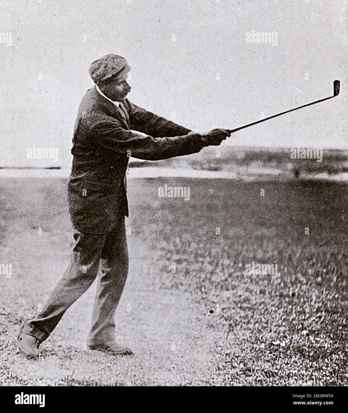 Open Champion golfer James Braid taking a shot. 1905 Stock Photo Alamy