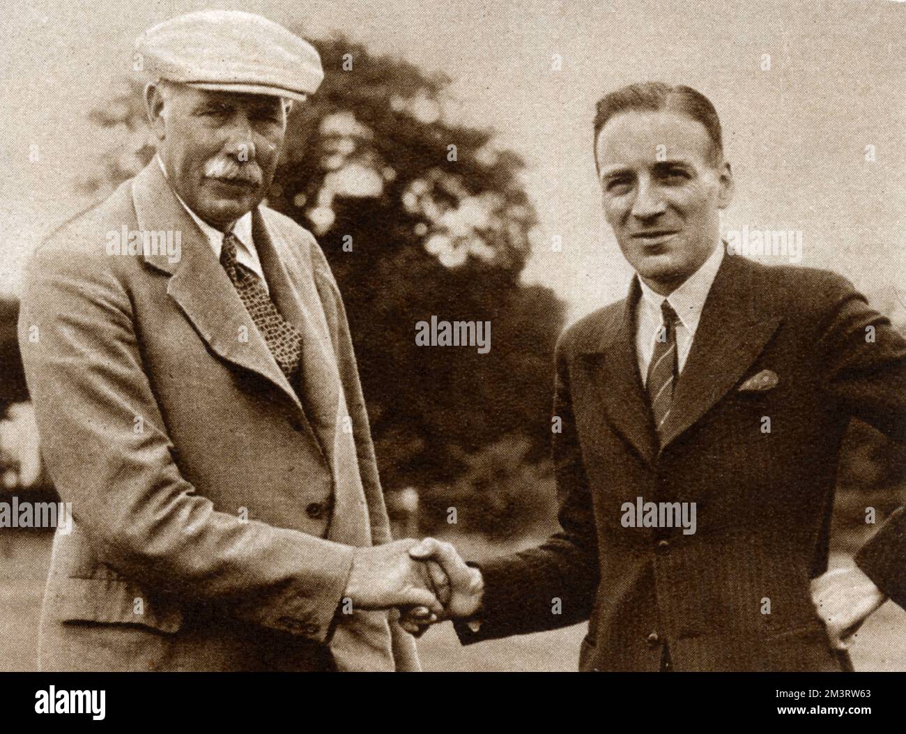New Secretary of Walton Heath Golf Club being greeted by the club professional James Braid.   1934 Stock Photo