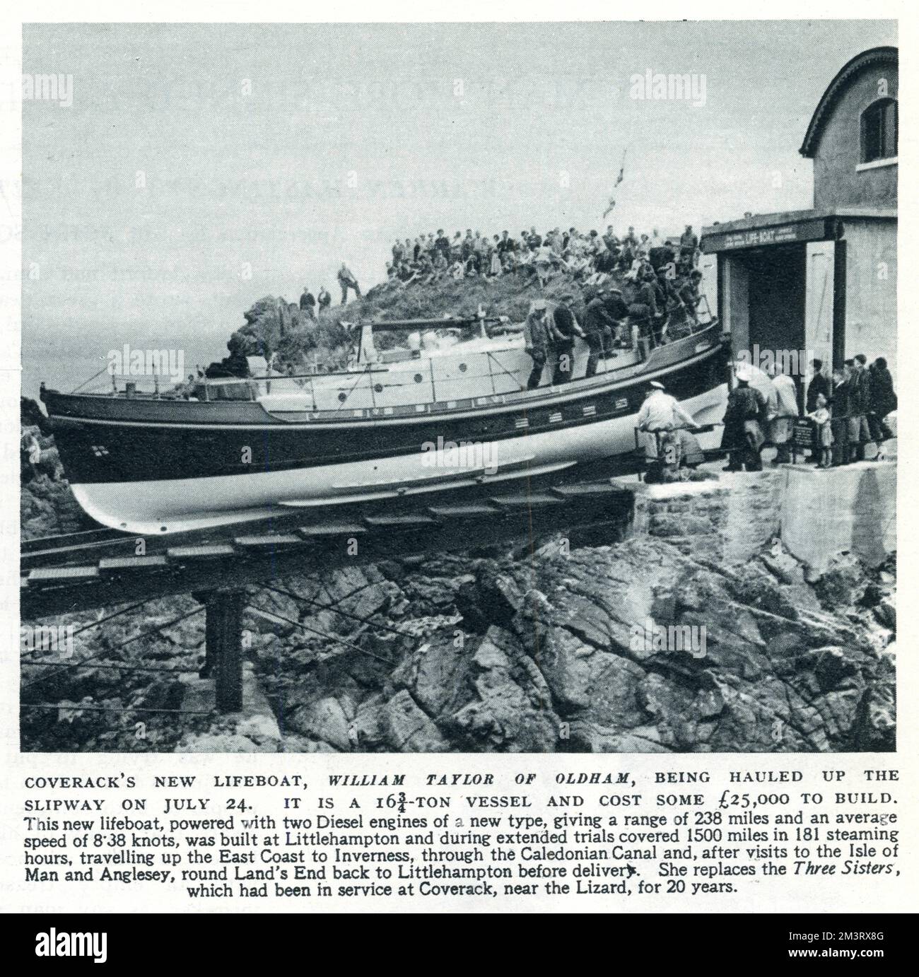 Coverack's new lifeboat, William Taylor of Oldham, being hauled up the slipway on 24th July 1954. It cost 25,000 to build. Cornwall.     Date: 1954 Stock Photo