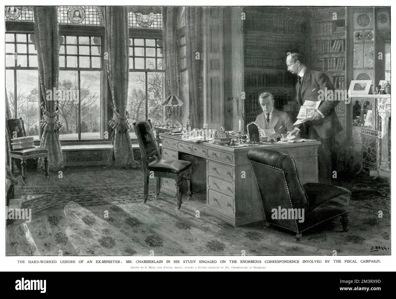 Joseph Chamberlain in his study engaged on the enormous correspondence involved by the fiscal campaign. Chamberlain is assisted by his private secretary, Mr Wilson.     Date: 1903 Stock Photo