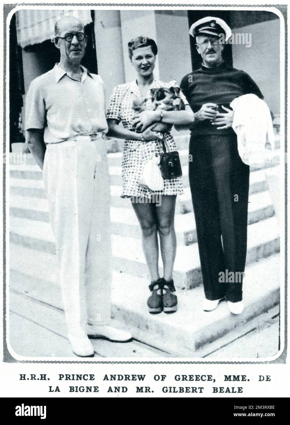 H.R.H. Prince Andrew of Greece, father of Prince Philip, Duke of Edinburgh, pictured with Mme. Andree de la Bigne and Mr. Gilbert Beale.  The Prince, who lived on the Riviera in his latter years when he separated from his wife, Princess Alice of Battenberg, was a guest on board Gilbert Beale's yacht, the Susannah Jane.  Andree de la Bigne was the Prince's mistress.    1938 Stock Photo