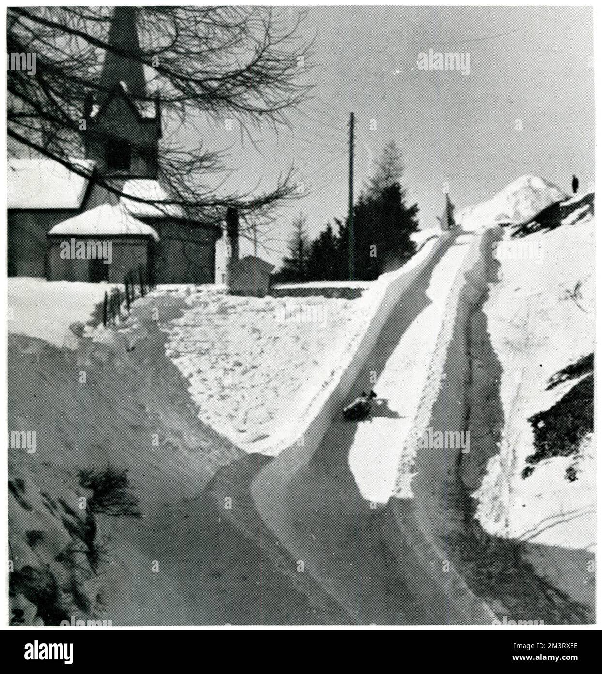 A noted point on the famous Cresta Run in St. Moritz - the Church Leap.     Date: 1924 Stock Photo