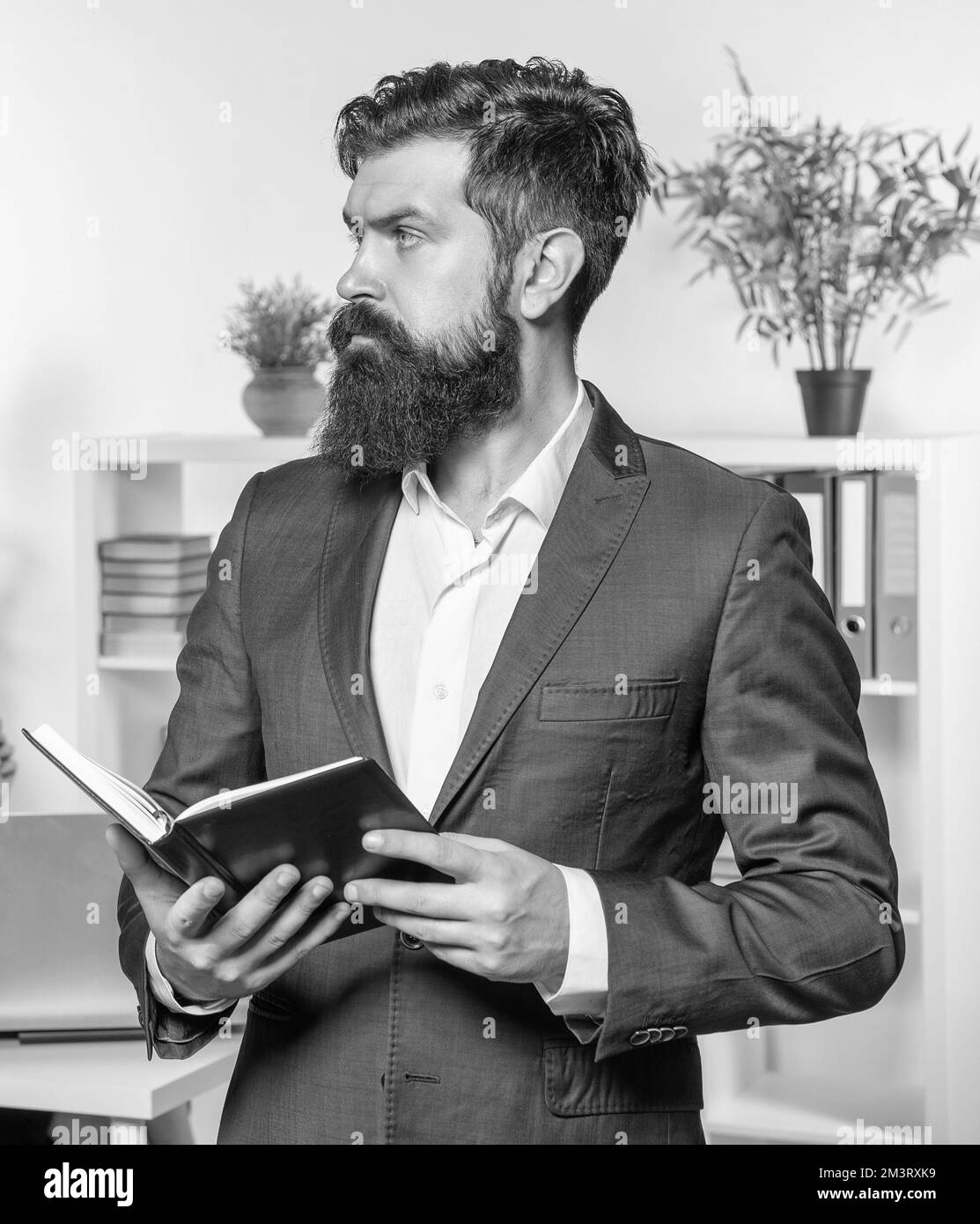 Focus on your work. Businessman hold personal organizer. Office work