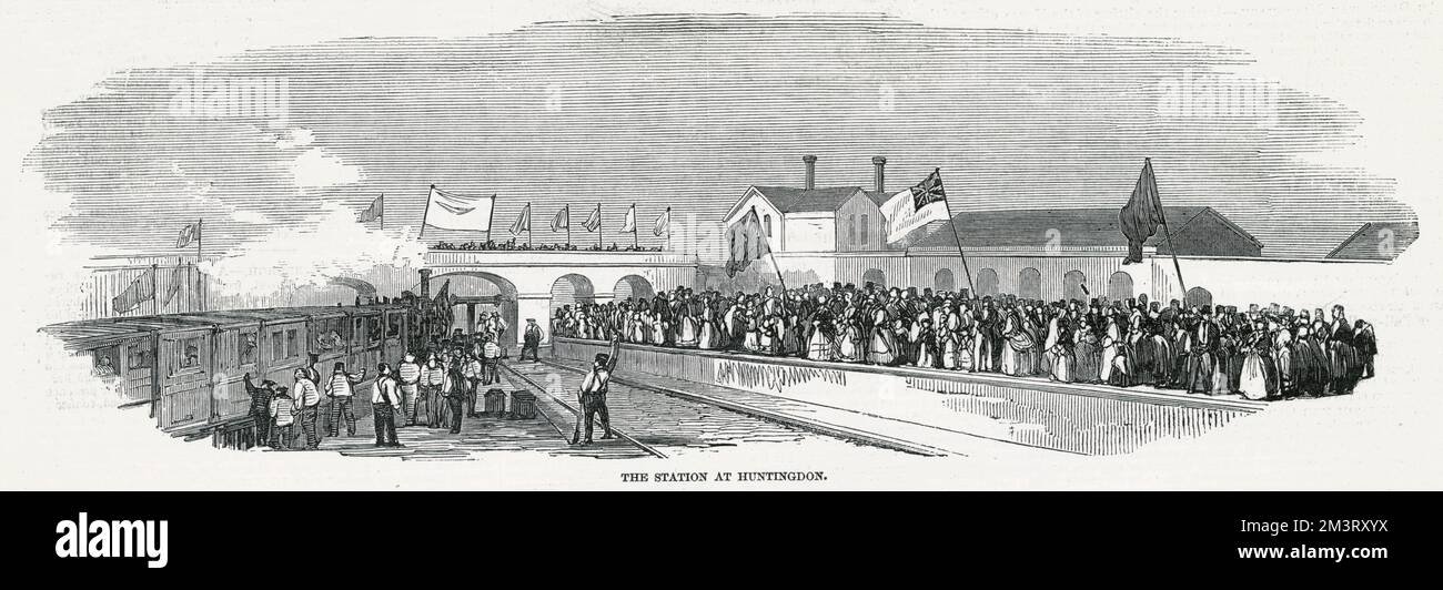Railway station at Huntingdon, Cambridgeshire, showing the opening celebrations.      Date: 1850 Stock Photo