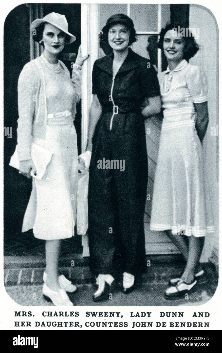 Mrs Charles Sweeny, looking as chic as ever, with Lady Dunn (rocking a rather fabulous jumpsuit) and her daughter, Countess John de Bendern at White's Club golf tournament at Sandwich, Kent in July 1938.     Date: 1938 Stock Photo