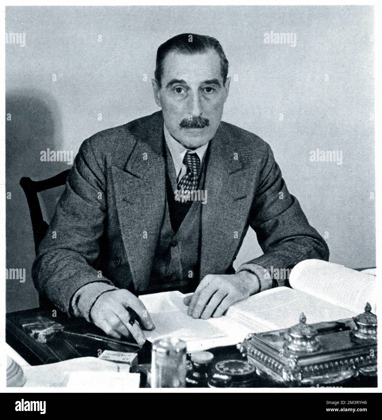Sir Nevile Meyrick Henderson GCMG (1882  1942), British diplomat and Ambassador of the United Kingdom to Nazi Germany from 1937 to 1939. Pictured in The Tatler at the time he was writing his memoirs, Water under the Bridges.      Date: 1940 Stock Photo