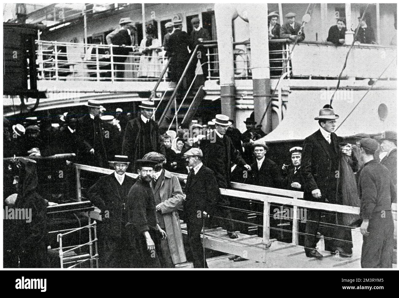 The arrival of the Australian rugby team at Plymouth on 19 September 1908. The team, who had come for a UK tour, playing at club and national level, are pictured walking off SS &quot;Omrah&quot;.      Date: 1908 Stock Photo