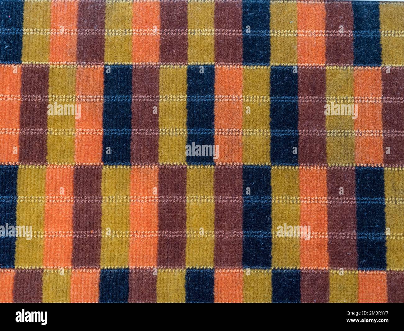 Leyland Titan T 'Moquette' seat covering used London Buses (1978-1984), in the London Bus Museum, part of Brooklands Museum, Surrey, UK. Stock Photo