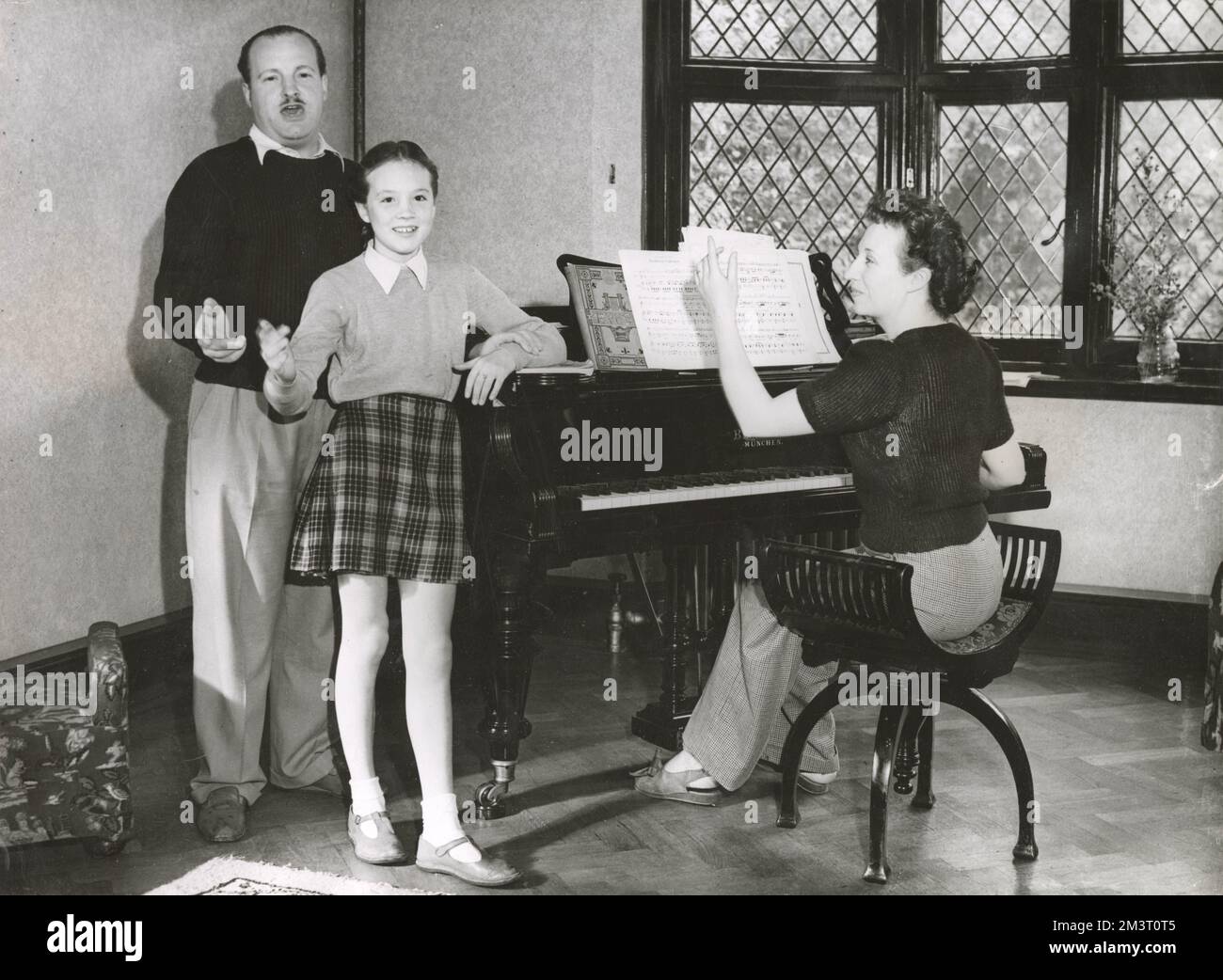Julie andrews aged 12 photographed at home with her mother barbara at