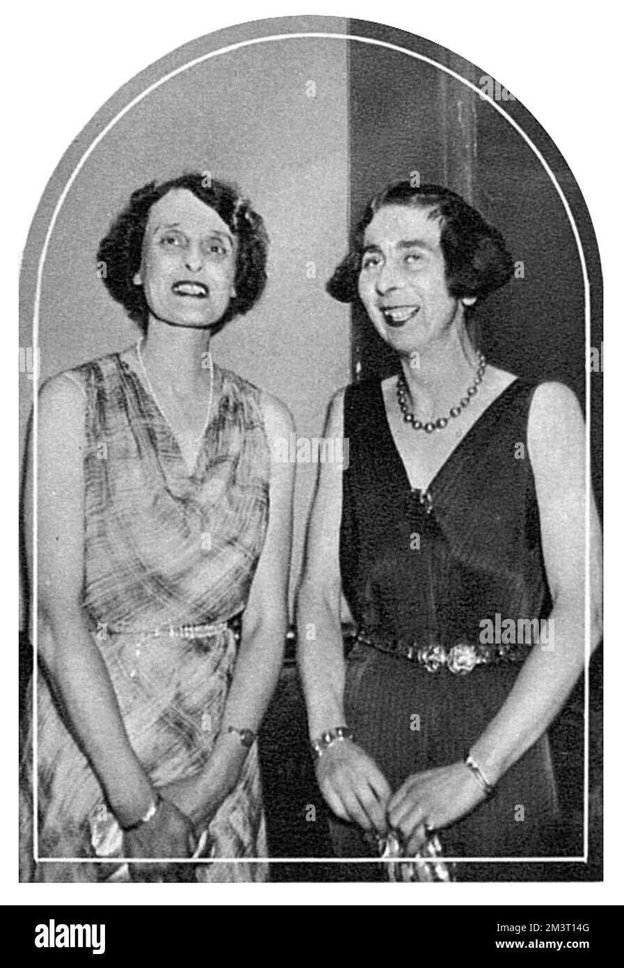 The prolific English author Edmee Elizabeth Monica Dashwood (1890-1943), commonly known as E. M. Delafield, and Lorna Lewis, British writer (?-1962) at Viscountess Rhondda's Literary 'Rout' (an evening party in Bloomsbury, London). Stock Photo