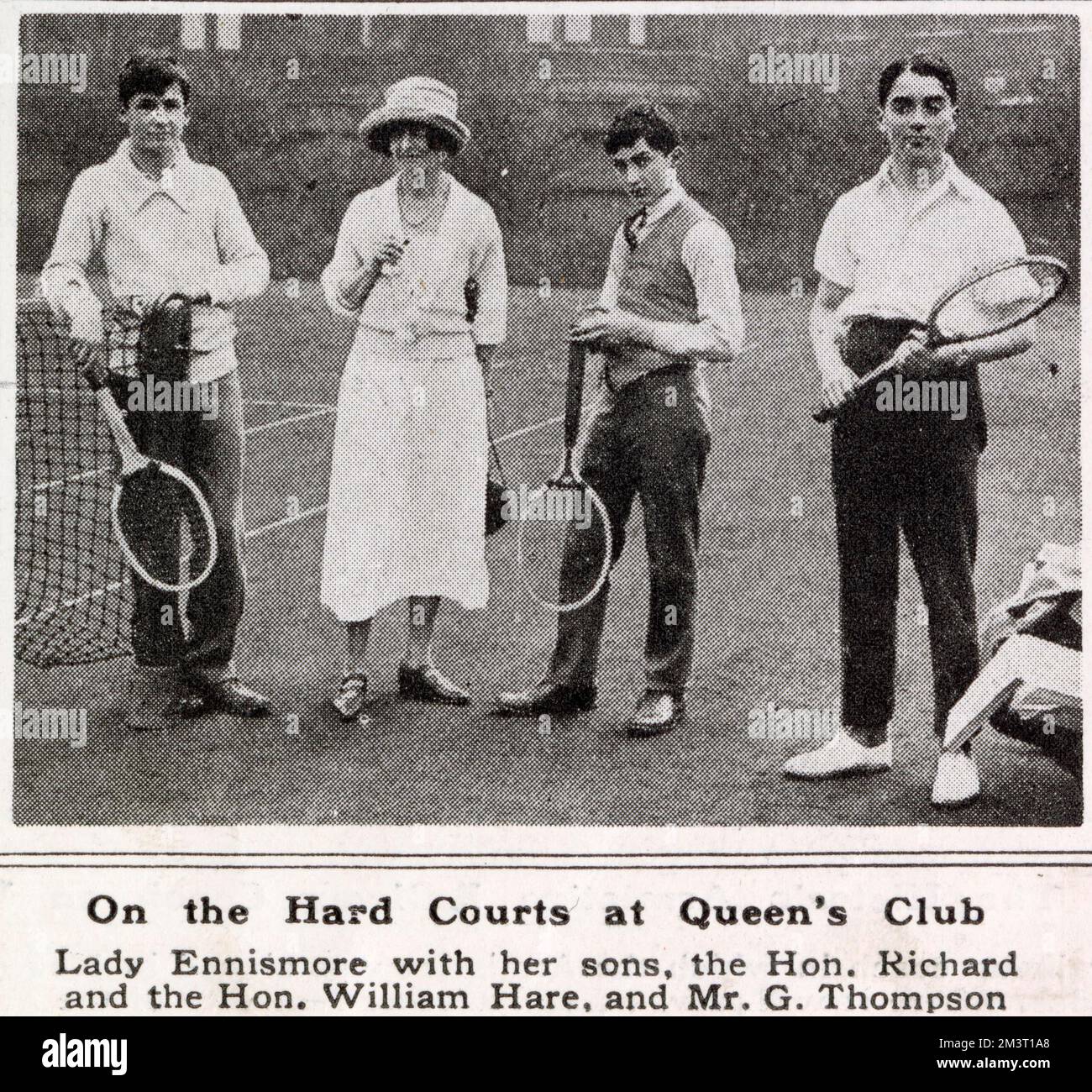 Lady Ennismore, formerly Freda Vanden-Bempde-Johnstone, married to the Earl of Listowel's heir, pictured at Queen's Club with two of her sons, the Hon. Richard Hare and the Hon. William Hare, the future 5th Earl of Listowel. Also pictured is Mr. G. Thompson. Stock Photo