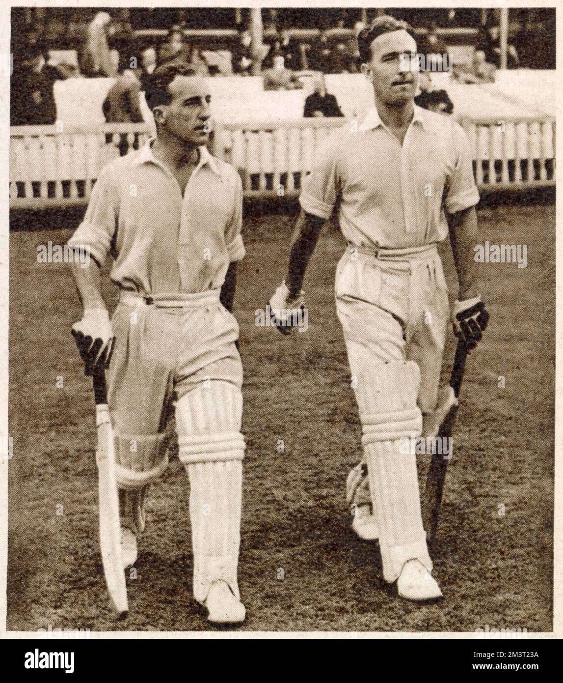 Bill Edrich and Denis Compton coming out to bat at Lord's Cricket ground during the legendary summer of 1947 when Compton scored 3,816 runs and Edrich 3,539. Stock Photo