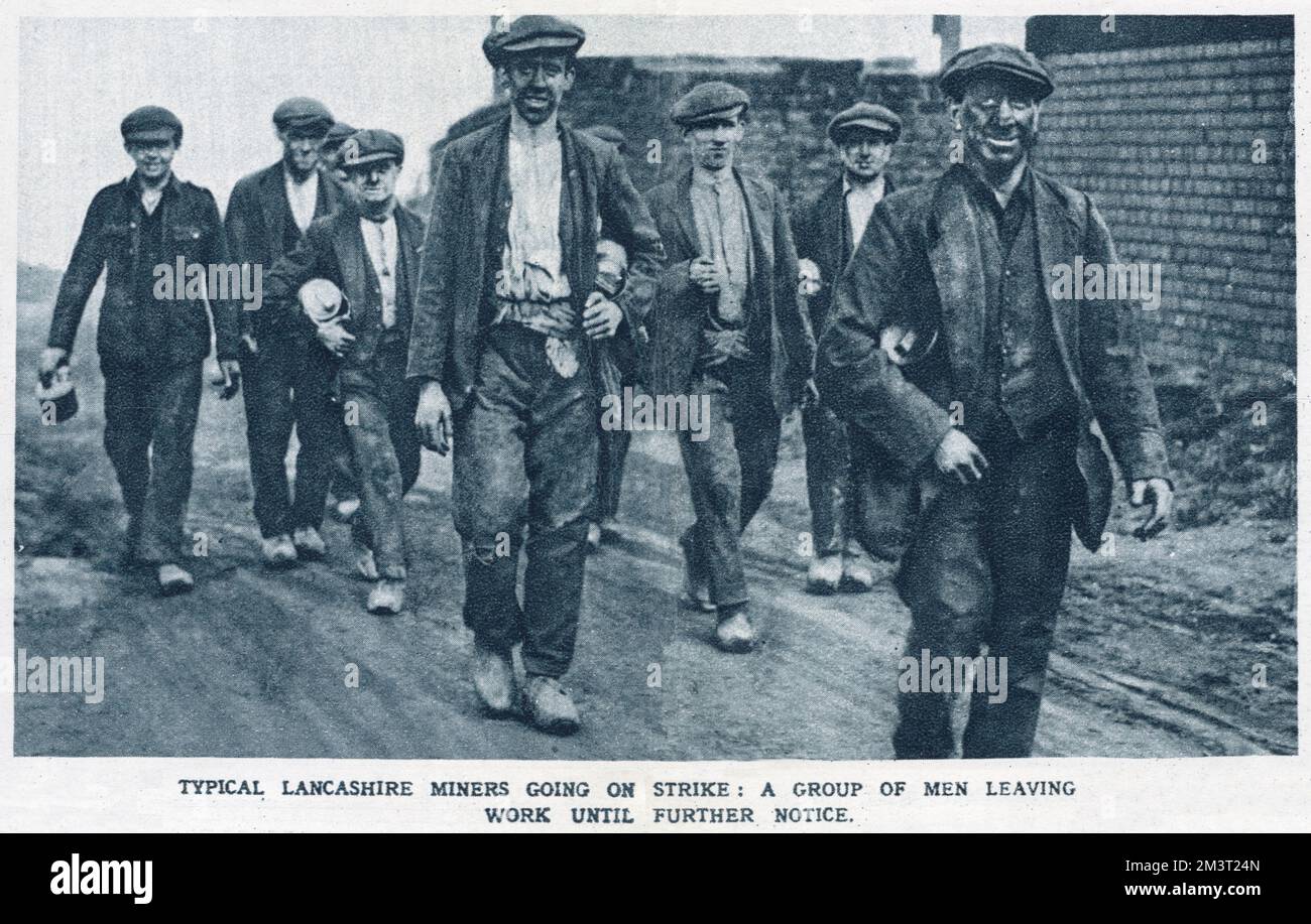 Typical Lancashire miners going on strike: A group of men leaving work until further notice. Stock Photo