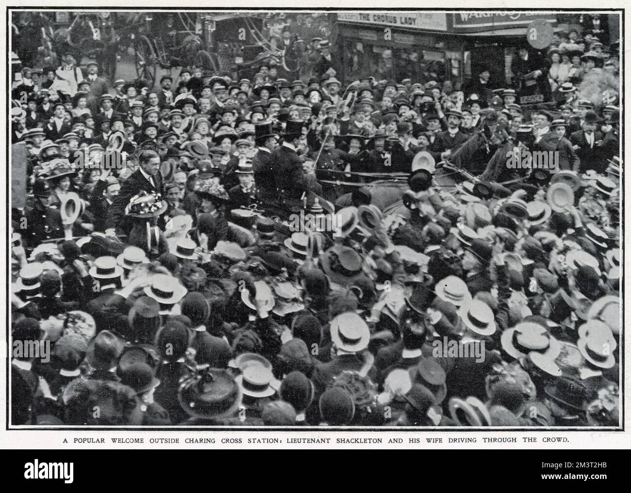 Welcome home from the far south: the hero of the moment. A popular welcome for Lieutenant Shackleton and his wife driving through the crowds outside Charing Cross Station, London, after his arrival at Dover from the successful Nimrod Expedition to the Antarctic. Stock Photo