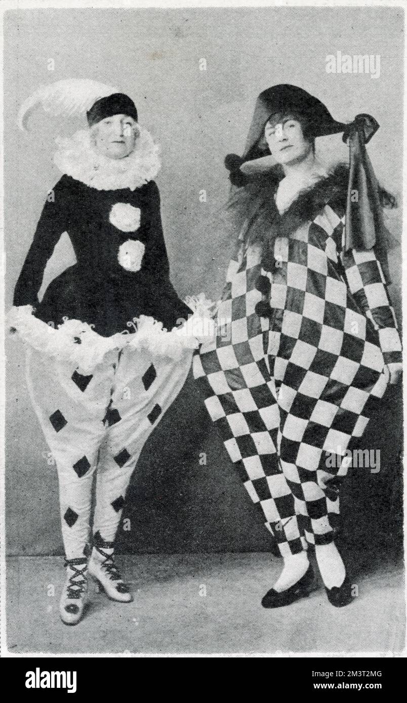Revellers in pierrot costumes at the Chelsea Arts Club Dazzle Ball held at the Albert Hall in March 1919. The theme was inspired by the technique of 'dazzle' painting, used to camouflage ships during the First World War. Stock Photo