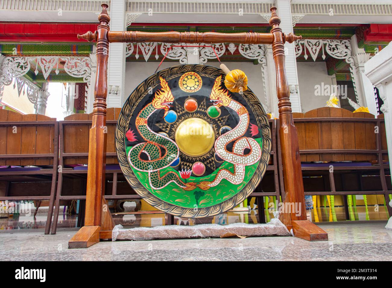 A gong decorated with Buddhist mythology, Buddhist temple, Thailand