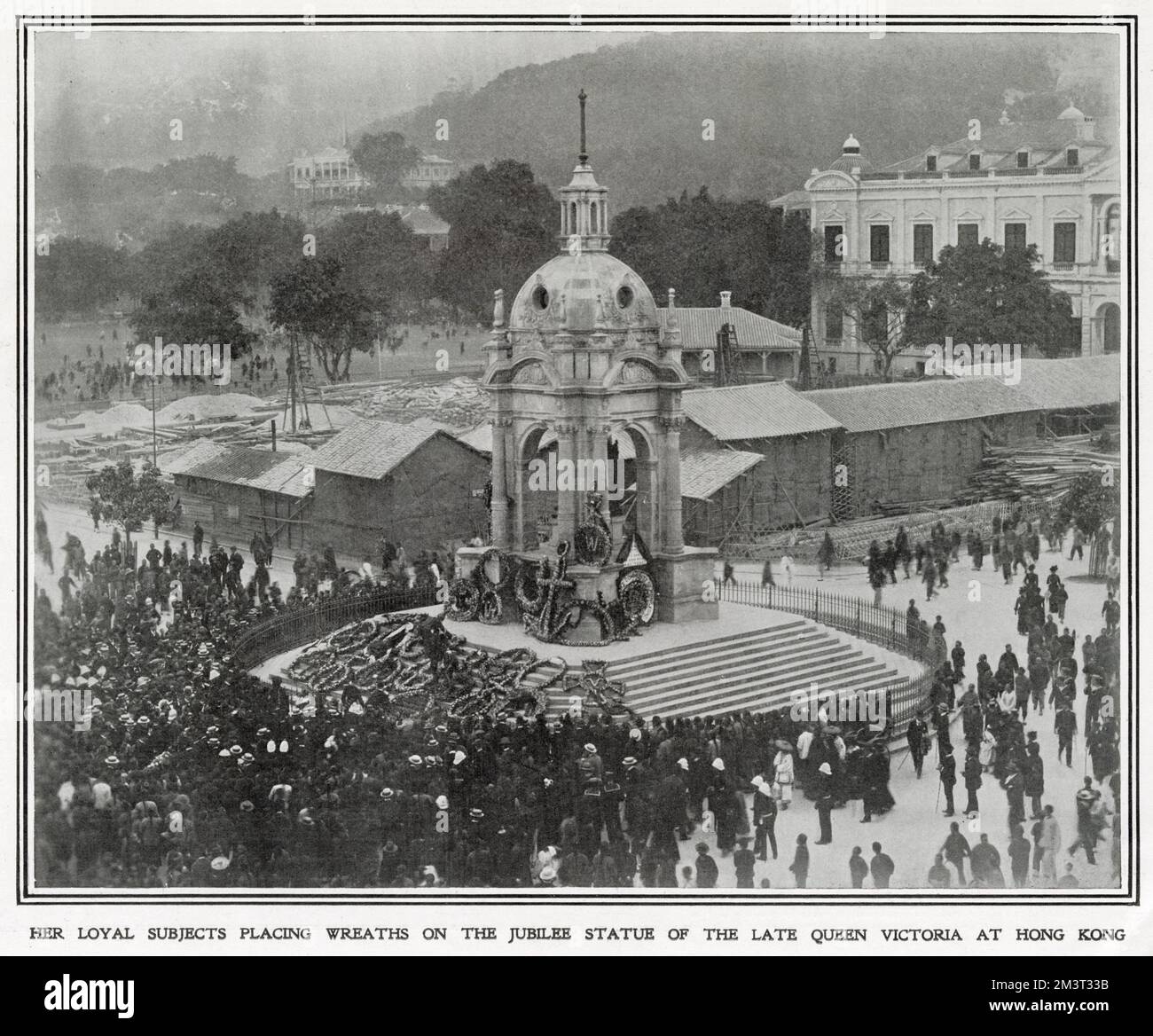 Loyal subjects placing wreaths on the Jubilee Monument at Hong Kong, after the death of Queen Victoria. Stock Photo