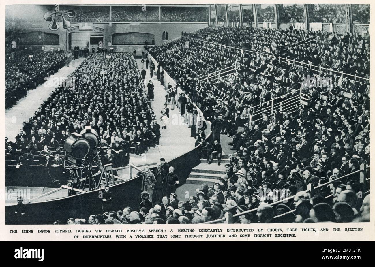 An audience of 15,000 at Olympia, 7 June 1934, for a meeting of the British Union of Fascists in which Sir Oswald Mosley, the only speaker, gave a speech lasting two and a quarter hours during which time there were numerous outbreaks of violence between Blackshirts and those opposing them. Stock Photo