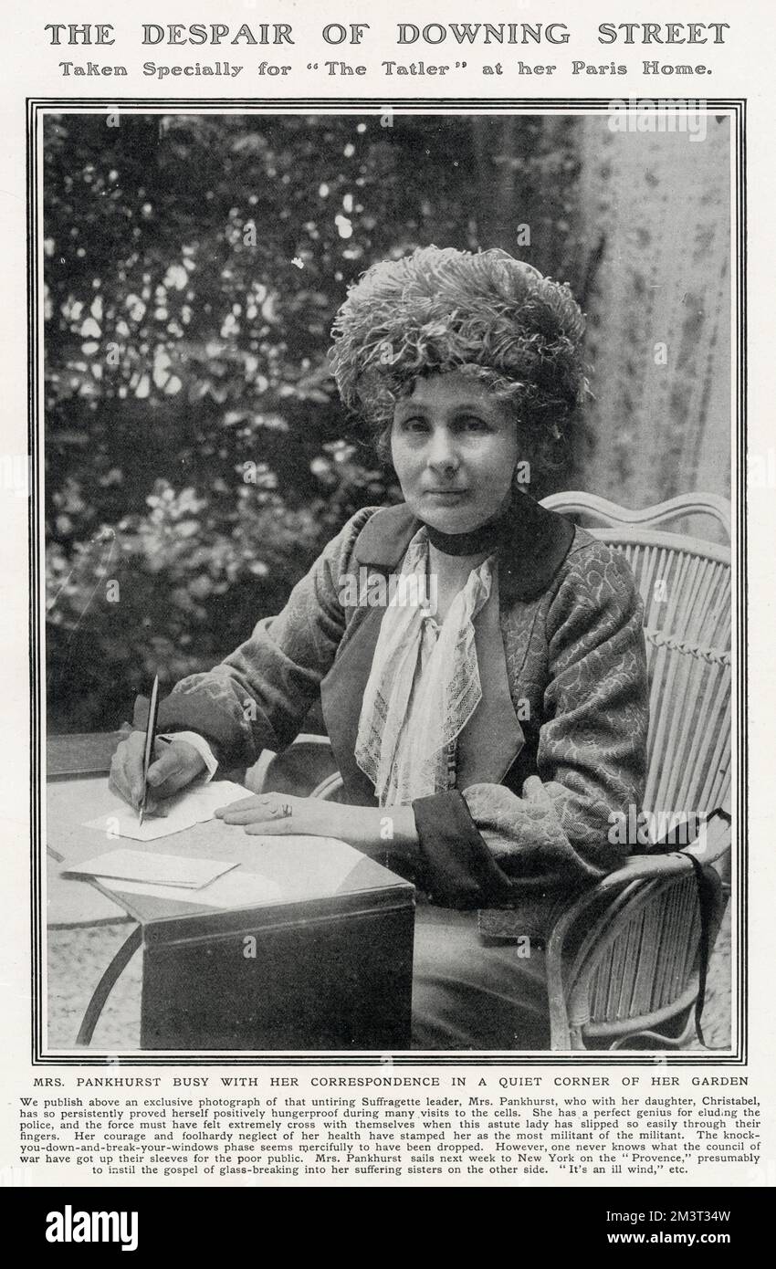 Emmeline Pankhurst pictured working on correspondence at her home in Paris in a photograph taken exclusively for The Tatler in 1913. She was staying there with her eldest daughter Christabel and later embarked on a tour of America. Stock Photo