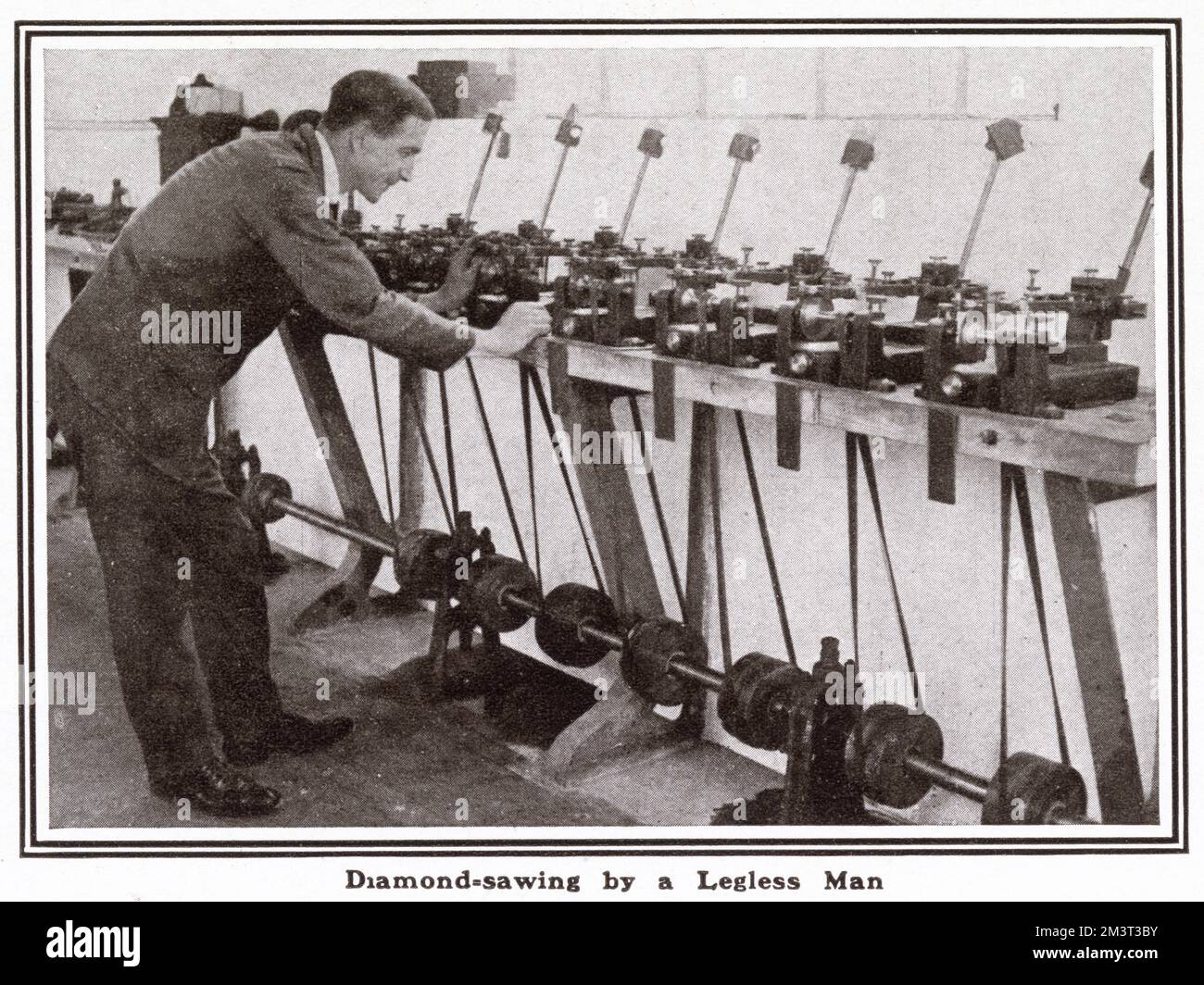 A injured ex-soldier using the diamond-saw. A pilot scheme was started in spring 1917 by Mr. Bernard Oppenheimer, a diamond merchant. The factory provided training for thousands of wounded ex-soldiers and sailors during and after World War One. Stock Photo