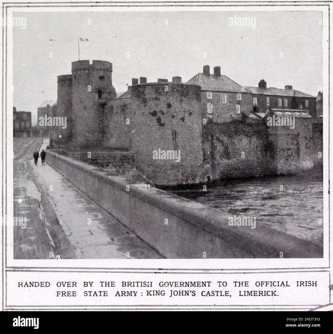 King John's Castle, Limerick, with the Irish flag flying, after it had been handed over to the Irish Free State Army by the British government. Stock Photo
