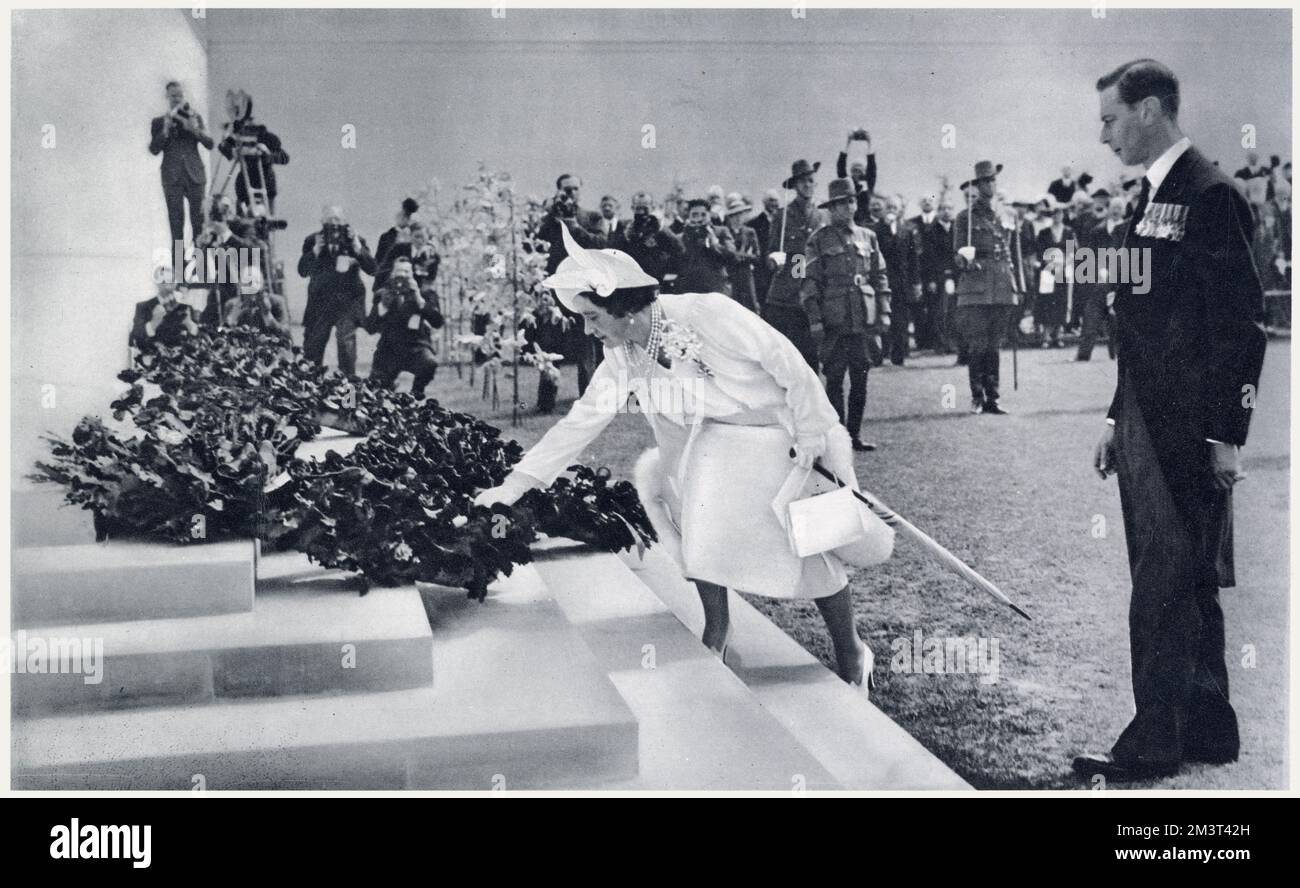 Queen Elizabeth spontaneously placing a single poppy upon the wreath previously laid by the King at the Australian War Memorial during their state visit to France in 1938. Stock Photo