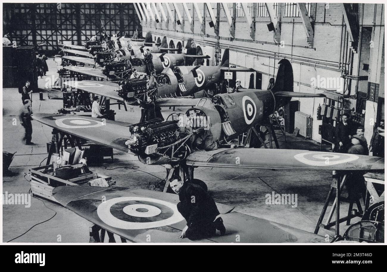 Mass production for the fighter squadrons of the Royal Air Force at Vickers-Supermarine works, Southampton, Britain. The method of construction facilitating the interchangeability of components.     Date: February 1939 Stock Photo